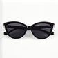 Folded view of Aarka Rosea designer cat-eye sunglasses with black frame and polarized lenses.