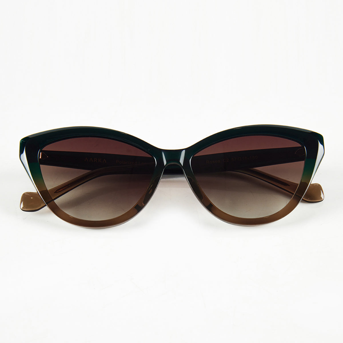 Folded view of Aarka Rosea designer cat-eye sunglasses with brown and black frame and polarized lenses.