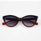 Folded view of Aarka Rosea designer cat-eye sunglasses with black and red frame and polarized lenses.