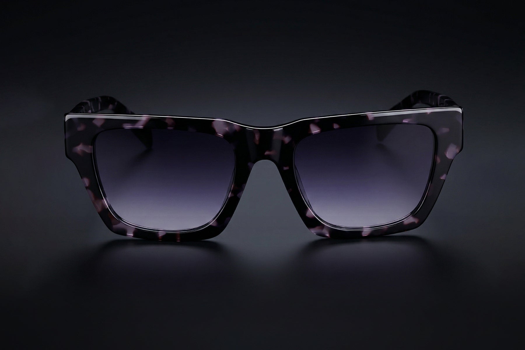 AARKA Camelia C3 polarized square sunglasses featuring a black and purple textured frame with purple gradient lenses, shown in a front view.