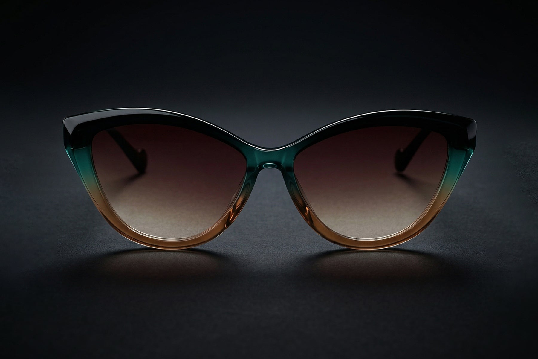 AARKA Rosea polarized cat-eye sunglasses featuring a green and brown gradient frame with gradient tinted lenses, shown in a front view.